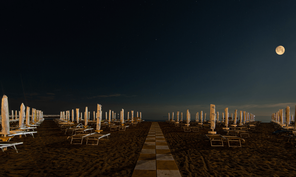 Summer on a solitary beach + full&nbsp;moon